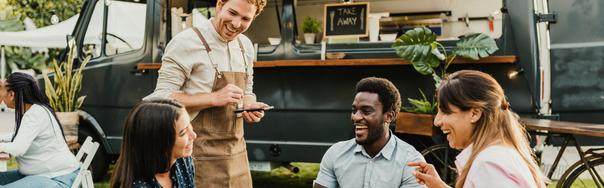 customer enjoying order in food truck